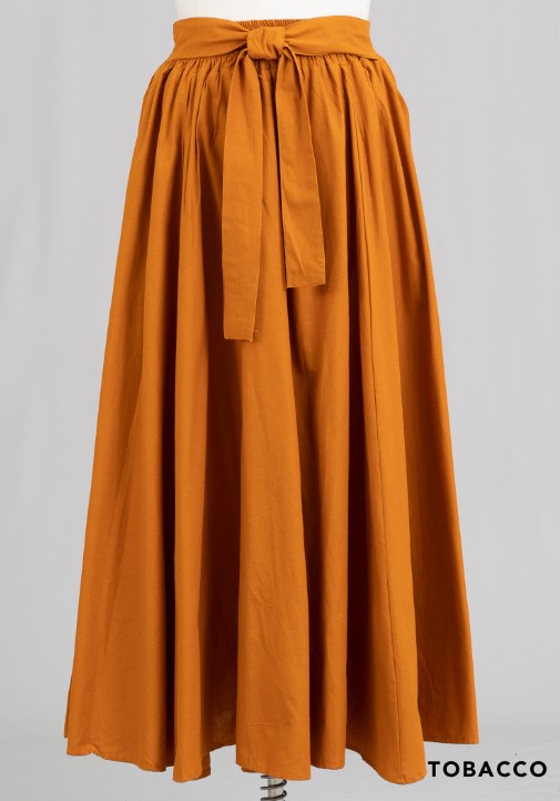 Made of 100% cotton, these skirts' eye-catching designs come in a multitude of colors. Stylishly belted at the waist, they possess a graceful ankle-length fit that makes a bold fashion statement at any event.