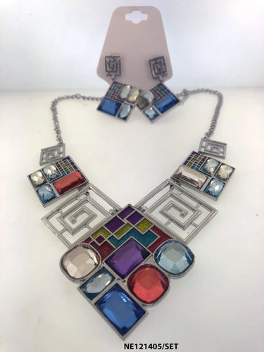 This necklace features a uniquely stylish geometric pattern and vivid stones of varying shapes. Complemented with a harmonizing pair of earrings.