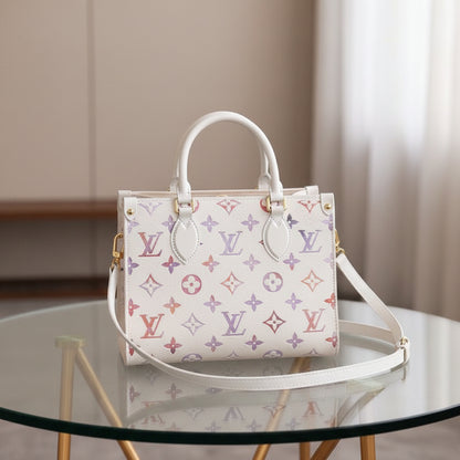 A Louis Vuitton monogram handbag in off-white canvas with gold-tone hardware, displayed on a rustic wooden table.
