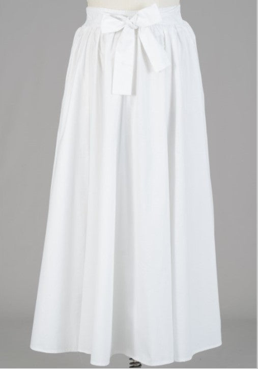 Made of 100% cotton, these skirts' eye-catching designs come in a multitude of colors. Stylishly belted at the waist, they possess a graceful ankle-length fit that makes a bold fashion statement at any event.
